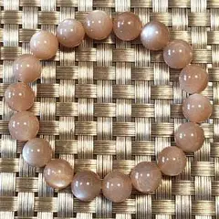 高品質オレンジムーンストーン5Aブレスレット、全玉シラー入り、約10ミリ玉
