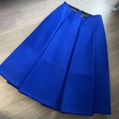 トリココムデギャルソン 鮮やかなブルーのボンディングプリーツスカートのサムネイル