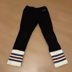 黒のストライプ裾ロングパンツ