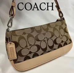 美品✨ コーチ　アクセサリーポーチ　シグネチャー　ブラウン　6094