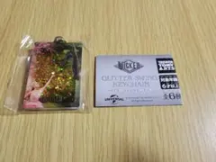 【新品】ウィキッド　グリッタースイングキーチェーン　ポスタービジュアル　ガチャ