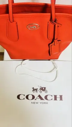 値下げ　COACH オレンジ トートバッグ、ショップ袋付き