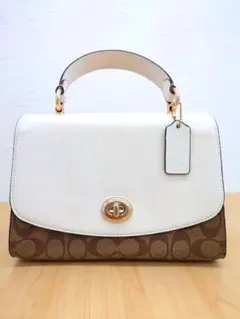 H*n様 COACH ペッパーサッチェルシグネチャーキャンバス - メルカリ