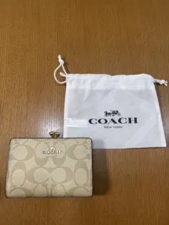 COACH ベージュ 二つ折り財布 保存袋付き