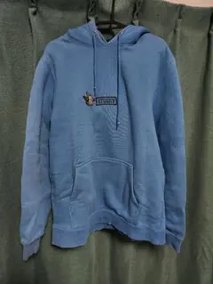 STUSSY フード付き青パーカー