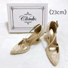 クライムClimbチャーム付き クロスストラップパンプス ベージュ