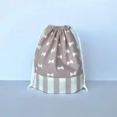 くすみカラーが可愛いリボン柄のピンク巾着　コップ袋　給食袋