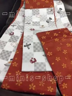 小袋半幅帯　宝尽くし　市松　桜吹雪　光沢刺繍　両面別柄　招福縁起柄のサムネイル