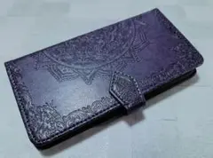 iPhone16e 用 スマホケース 手帳型 浮彫曼荼羅 パープル