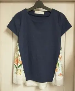 Ladies' floral print short-sleeved top in navy with contrasting panels.