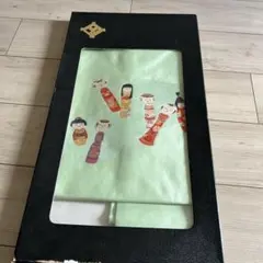 こけし柄の帯　新品！のサムネイル