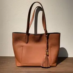 【訳あり】コールハーン　オレンジ レザー トートバッグ タッセル付き