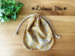 ハンドメイド✳︎巾着✳︎裏地付き✳︎リネンコード✳︎オレンジ花柄