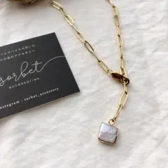 square pearl × long oval chain necklace