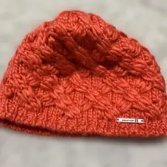 salomon オレンジ ケーブル編み ニット帽