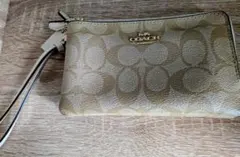 COACH ゴールド系 ロゴポーチ 小型