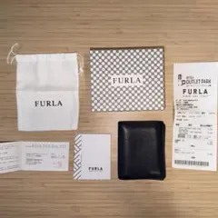 FURLA ネイビー 二つ折り財布 保存袋付きのサムネイル