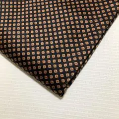 【新品】布地　生地　小紋柄　黒×金茶寄りのオレンジ