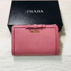 PRADA】プラダ 折り畳み財布 ピンク美品【正規品証明書付き】 - メルカリ