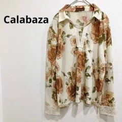 Calabaza/カラバサ トップス 長袖 スキッパー風 袖口レース 花柄
