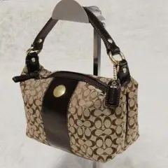 COACH コーチ ポーチ キャンバス ミニバッグ ブロンズ 茶 - メルカリ