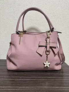 D.KELLYのリボン付きピンクハンドバッグ