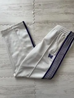 2026年最新】needles トラックパンツ 白の人気アイテム - メルカリ