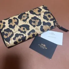 COACH 長財布 レオパード柄 ストラップ付き - メルカリ