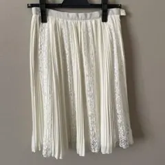 アイボリー プリーツスカート ひざ丈　ジャスグリッティー