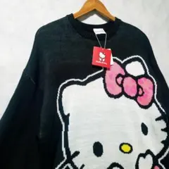 新品　Sanrio　HELLO KITTY　ニットセーター　桃色リボン　M　黒色