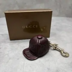 Gucci GG Embossed Leather Cap Keychain