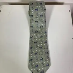 HERMES 馬と人のプリント ネクタイ