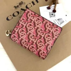 新品 COACH コーチ　折り財布　ピンク　二つ折り財布 COACH柄