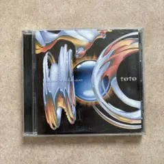 TOTO CD THROUGH THE LOOKING GLASS