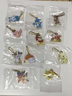 デジモンアドベンチャー メタルキーホルダー プレミアムセット - メルカリ