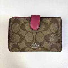 ◇COACH シグネチャー 二つ折り財布 ピンク - メルカリ