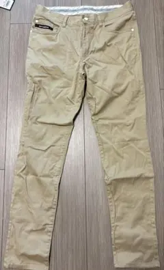 New Balance ベージュ チノパン スリムフィット