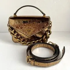 GUESS メタリックブロンズ ミニハンドバッグ 2WAY ゴールド - メルカリ