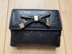 GUCCI ブラックレザー 二つ折り財布 GGシマ