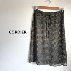 CORDIER コルディア 総柄ひざ丈スカート ウエストリボン付き サイズ40のサムネイル