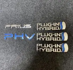 最安値！【新品】トヨタ純正品 PRIUS用 HEV エンブレム - メルカリ