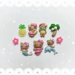 ネイルパーツ 9P〈J037〉日焼け キティ ガングロ イルカ ハイビスカスのサムネイル