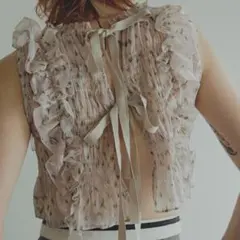 スナイデル　SNIDEL バックリボンシャーリングブラウス シアー　フリル