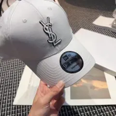 商品名 YSL ロゴ キャップ New Era 9FIFTY スナップバック