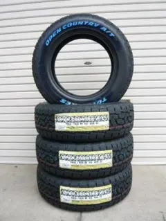 TOYOオープンカントリーAT3 215/65R16 ハイエース・キャラバン - メルカリ