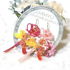 handmade ❁⃘*.゜ 水引の花束と花柄にゃんこのピアス