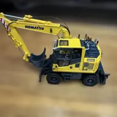 コマツPW148 ホイール式油圧ショベル(モノブーム)1/50 KOMATSU - メルカリ