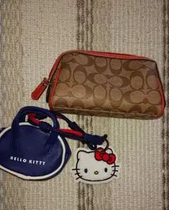 Coach モノグラムポーチ ハローキティ付き