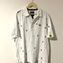 美品✨AKDMKS✨アカデミクス⚡️ブランドロゴ他総柄　ビックサイズ　ポロシャツのサムネイル