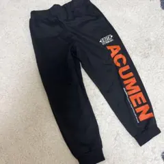 プリント入り黒スウェット長ズボン